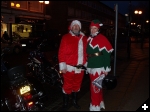 [Santa and his huge elf]